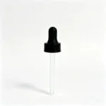 Compte-gouttes en verre à bouchon vissé noir vu de face avec une poire en caoutchouc noire et une pipette en verre transparent
