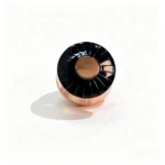 Black and gold round plastic perfume cap shown from the top with the circular top surface and electroplated finish clearly visible