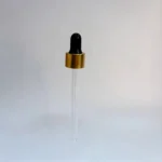 Gold aluminum collar glass dropper shown from the front with a black rubber bulb and transparent glass pipette