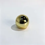 Gold round ABS perfume cap shown from the rear with its circular profile and gold exterior clearly visible